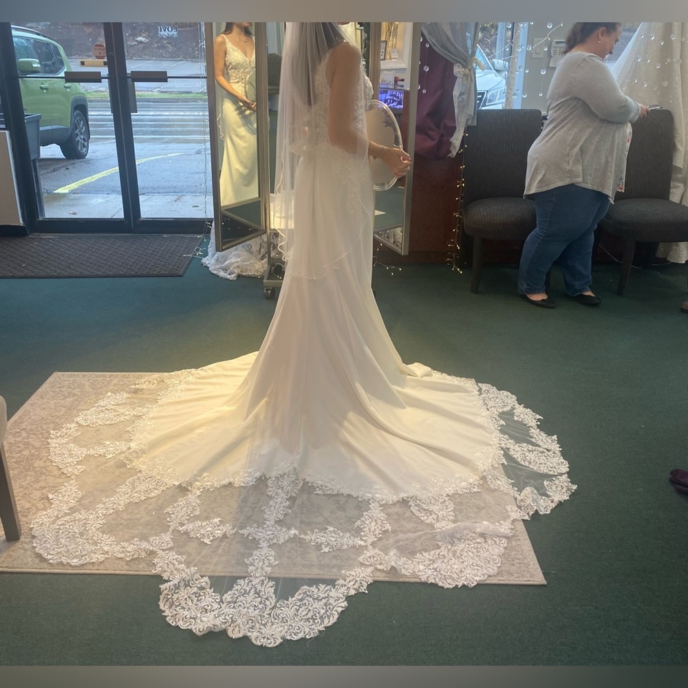 Size 12 Stella Couture Wedding Dress. Never Worn. Decided to get a new dress.
